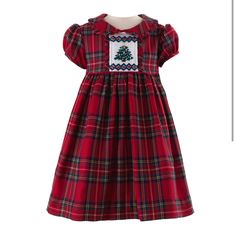 New With Tag Treat Your Little One To The Cutest Christmas Look With This Irresistible Tartan Dress! Featuring Cheery Hues Of Red And Green, Puff Sleeves, A Darling Collar, Frill Trims, And A Hand-Smocked Christmas Tree On The Bodice, This Holiday Outfit Is Oh-So-Special. Fully Lined With A Button Closure And Sash To Tie At The Back, This Festive Ensemble Will Bring Extra Joy! Shell: 80% Polyester, 17% Viscose, 3% Elastane. Lining: 100% Cotton Machine Wash With Similar Colours. Medium Steam Iron Smocked Christmas Dresses, Tartan Plaid Christmas, Festive Dress, Christmas Tree Dress, Rachel Riley, Tree Dress, Plaid Christmas Tree, Green Tartan, Hand Smock