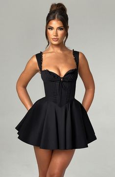 The super flirty, romantic Antonella mini dress will take you from bottomless brunch to garden parties and more. Made from a lightweight cotton blend, this mini has a super cinched waist contrasted with a full skirt, pintuck detailing to the front and lace up back. The fan shaped straps are adjustable for your perfect fit. Wear yours with lemon heels and bag. 



Colour: Black.

Premium nylon cotton blend fabric.

Fully lined.

Button detailing to bust.

Fan shape adjustable straps.

Tie on unde Holiday Dresses Women, Bottomless Brunch, Elegant Mini Dress, Black Tie Dress, Mini Robes, Lace Splicing, Suspender Skirt, Backless Mini Dress, Chic Outfit