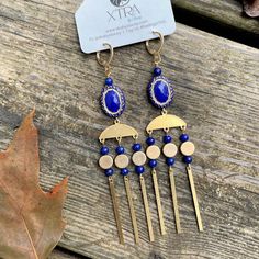 lapis statement earrings Gold Chandelier Earrings, Lapis Earrings, 2024 Outfits, Royal Blue And Gold, Dalmatian Jasper, Brass Beads, Rice Bead, Lapis Lazuli Stone, Gold Chandelier