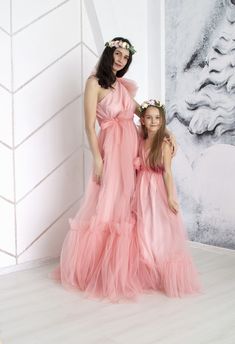 "Tulle dress Mother daughter Coral mommy and me dress Matching Long dress Fluffy tulle dress Family outfits Mother daughter dress Matching 100% REAL PHOTOS We guarantee you high quality tailoring and fabrics! This long coral pink tulle dresses for mommy and me on one shoulder is gorgeous for photo shoots. Color#67 in our color chart - Coral-pink ⚠️Please note that the colors of the objects on photos may differ from real⚠️ MATERIALS: Tulle: Luxury wedding tulle \"Hayal Tulle\" .Draped, flexible, Flowy Tulle Dress For Party, Summer Bridesmaid Tutu Dress With Ruffles, Pink Tutu Dress For Summer Bridesmaid, Pink Summer Tutu Bridesmaid Dress, Summer Bridesmaid Princess Dress With Ruffles, Spring Princess Tulle Gown, Summer Tulle Princess Dress, Pink Tulle Mesh Dress, Pink Sleeveless Tulle Maxi Dress