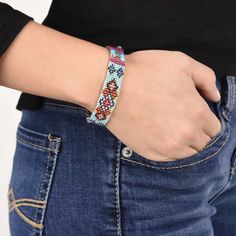 ARTIST: Adonnah LangerSIZE: 7 1/2” adjustable braceletMATERIAL: .925 sterling silver, Czech fire polished glass beadsITEM: PB18B661-CYORIGIN: Santa Fe, NM MADE TO ORDER - 2-3 WEEK LEAD TIME Chili Rose, Artisan Bracelets, Santa Fe Nm, Ring Watch, Belt Accessories, Mens Jewelry Bracelet, Cuff Earrings, Bird Design, Lead Time