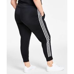 Keep active in these fitted Women's Essentials Warm-Up Slim Tapered 3-Stripes Track Pants from adidas, designed for zero distractions with a close, tapered fit that stays securely in place. The elastic waist features a convenient drawcord to customize coverage and comfort, while front pockets stash music players or cash. Breathable polyester fabrication keeps you cool whether climbing stairs or dropping low into squats, with flatlock seams preventing chafing. Subtle 3-Stripes branding adds style Adidas Sportswear Bottoms For Jogging, Adidas Sportswear Jogging Bottoms, Athleisure Jogging Bottoms With Three Stripes Branding, Adidas Sweatpants With Three Stripes For Workout, Athleisure Jogging Bottoms With Three Stripes, Athleisure Bottoms With Three Stripes For Jogging, Adidas Sportswear Sweatpants For Workout, Casual Adidas Sweatpants For Workout, Casual Adidas Joggers For Workout