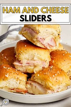 ham and cheese sliders stacked on top of each other in a white plate with text overlay