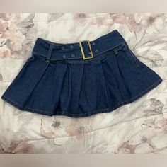 Fits A A/M (Size 4/6) Very Short Not Super Cute Stretchy Denim Fabric Never Worn By Me Great Condition Doesn’t Have A Brand Inside Denim Pleated Skirt Y2k, Cotton Pleated Mini Denim Skirt, Denim Blue Pleated Mini Skirt, Pleated Denim Mini Skirt Y2k, Y2k High-rise Denim Blue Mini Skirt, Black Pleated Mini Skirt, Grey Mini Skirt, Bubble Skirt, Golf Skirts