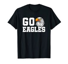 PRICES MAY VARY. Go Eagles! Show your school pride with this fun Go Eagles design. Great for school spirit dress up days, pep rally, or assembly. Elementary school, grade school, junior high, middle school, high school, varsity, jv, junior varsity. For parents with sons and daughters play basketball, volleyball, football, softball, baseball or any school sports. School administrators, teachers, and staff can always use cool gear with the school's mascot name. Lightweight, Classic fit, Double-nee School Spirit Tops For Football Season, Team-colored Graphic Print T-shirt For School, Graphic Print School T-shirt In Team Colors, Pre-shrunk Team Spirit T-shirt For School, Spirit Dress Up Days, Casual Black T-shirt For School Events, Team Spirit Graphic T-shirt For School, Pre-shrunk T-shirt For School Team Spirit, College T-shirt With School Spirit