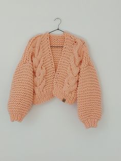 "Chunky Knit Cardigan, Cropped Chunky Sweater, Hand Knitted Jumper, Open Style Cardigan, Chunky Jacket, Sweater Women's Cozy, Sweater Loose fit One size Oversized Color pink Color black Color green Color navy blue Lenght 16,53\" (42cm) Width 22,80\" (58cm) Lenght of sleeve 15,74\" (40cm)   This warm pink,  black and navy blue cardigan is knitted by me from a thick yarn 25% Wool 75% Acrylic This warm green cardigan is knitted by me from a thick yarn 30% Alpaca, 10% Wool 60% Premium Acrylic Handma One Size Yarn Cardigan For Fall, Casual Yarn Cardigan For Fall, Knitted Long Sleeve Outerwear, Winter Yarn Outerwear With Long Sleeves, Long Sleeve Yarn Outerwear For Winter, Casual Yarn Outerwear For Winter, Cozy V-neck Knitted Sweater, Casual Yarn Outerwear For Fall, Cozy Acrylic Yarn Knitting Pattern