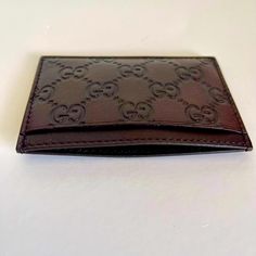 Upgrade Your Game With This Brand New Gucci Gg Bow Compact Signature Wallet Brown Leather Dimensions: 4.3” X 2.6” Inches (11 X 7,5 Cms) Still In The Plastic Envelope. Gucci Gift Box Included Gucci Brown Wallets With Interior Card Slots, Brown Gucci Wallets With Interior Card Slots, Designer Gucci Wallet With Logo Plaque, Designer Wallets With Engraved Logo For Professional Use, Designer Business Wallets With Engraved Logo, Luxury Gucci Wallets With Logo Plaque, Luxury Wallets With Engraved Logo For Everyday Use, Luxury Wallets With Engraved Logo, Gucci Leather Wallets With Rfid Blocking