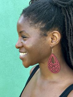 Create a style of your own with these beautiful stained Laser cut wooden earrings. These earrings are lightweight and hypoallergenic (nickel free).  These earrings also make a great gift for yourself, friend or loved one on holidays or just because.  Note: These earrings are unique, due to natural variances in the wood each earring may look slightly different than the ones pictured. No two items will look exactly the same, thus creating a custom look just for you. ♥ Thank you for your support ♥ Red Everyday Earrings, Adjustable Hypoallergenic Teardrop Earrings, Adjustable Teardrop Plug Earrings For Pierced Ears, Trendy Red Teardrop Earrings, Trendy Teardrop Chandelier Earrings For Pierced Ears, Laser Cut Earrings, Cut Earrings, Earrings Trendy, Trendy Earrings