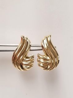 "Thanks for shopping our vintage estate store. We tend to sell well below wholesale and truly hope you enjoy all of our items. Many of the items are one of a kind, so please enjoy scrolling through the pictures and hopefully something will catch your eye. Brown spots are from camera or reflections. Nice estate new 14k yellow gold wave earrings. Length: 1\" Width: 3/4\" Weight: 3.20 grams Earrings are marked 14k." Retro Gold Earrings For Anniversary, Retro Yellow Gold Formal Earrings, Gold Retro Earrings For Anniversary, Vintage 14k Stamped Earrings For Formal Occasions, Vintage Yellow Gold Earrings With Lever Back, Vintage Yellow Gold Collectible Earrings, Vintage 14k Gold Earrings, Vintage Yellow Gold Earrings For Anniversary, Vintage Yellow Gold Hoop Earrings For Formal Occasions