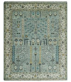 The Oriental Oushak design with a classic color combination of Blue and Ivory gives it an antique look. The rug is made with fine Wool. It is a perfect pick to give your interior a classic feel. Hand-knotted wool rug All sizes are made to order in 30 - 45 days Made with fine Hand-spun Wool Color: Blue and Ivory Contact Living Colors, Tree Designs, Wool Area Rug, Moss Green