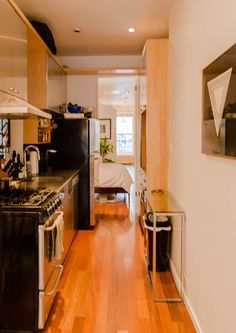 the kitchen is clean and ready to be used as a living room or dining area