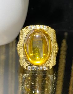 Vintage 15K 610 Yellow Gold Citrine Cabochon & White Topaz Tiger Ring ...Marked 610 and tested 15K Gold...Total of weights 18.2grams...Size 8.5...Measure of Face 24.5MM...It's in very good condition. Gia Certified Gold Gemstones For Formal Occasions, Oval Gold Diamond Cabochons, Yellow Cabochon Rings For Anniversary, Gold Gemstone Cabochons For Anniversary, Gold Cabochon Gemstones For Anniversary, Gold Polished Cabochons For Anniversary, Tiger Ring, White Topaz, Rings Statement