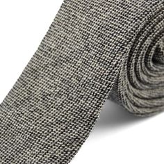 * Luxe cashmere
 * Neutral hue
 * Understated pattern Classic Wool Suit And Tie Accessories For Winter, Classic Winter Wool Suit And Tie Accessories, Elegant Fall Workwear Ties, Elegant Fall Ties, Classic Wool Suit And Tie Accessories For Fall, Elegant Fall Standard Tie, Classic Gray Ties For Workwear, Classic Gray Ties For Work, Classic Beige Ties