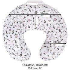 the measurements for a neck pillow with flowers on it