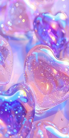 several heart shaped bubbles are shown in this close up photo, as if they were floating or floating on water