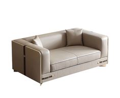 a beige couch with two pillows on it