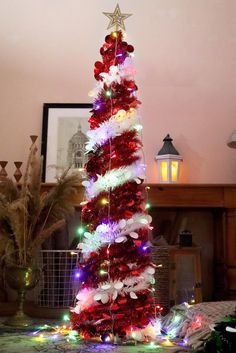 a christmas tree decorated with lights and decorations