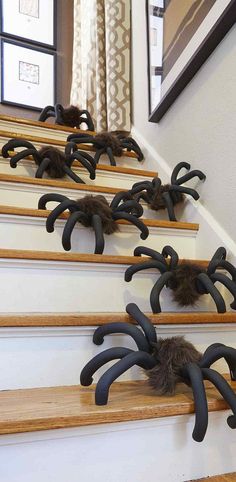 some fake spider legs are on the stairs