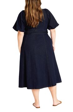 Elevate your office-casual look in this denim midi designed with a belted waist and airy flutter sleeves. 47" length Hidden back-zip closure V-neck Short sleeves Removable belt Unlined 100% cotton Machine wash, line dry Imported Belted Midi Denim Dress For Work, Knee-length Belted Denim Dress For Work, Belted Midi Denim Dress In Medium Wash, Short Sleeve Belted Denim Workwear Dress, Chic Belted Knee-length Denim Dress, Belted Medium Wash Dress For Work, Belted Denim Dress With Short Sleeves For Work, Chic Knee-length Belted Denim Dress, Chic Medium Wash Belted Denim Dress