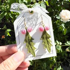 You are checking out a pair of well made earrings using pieces from micro crocheting method. Since they are all handmade. They are one of kind. Leaf size: Approx. 0.75 x 1.75 inch Berry size: Approx. 0.25 x 0.25 inch Earring material: 14k gold plated Hand Knitted Jewelry As A Gift, Crochet Leaf Earrings, Christmas Tree Crochet Earrings, Monstera Crochet Earrings, Handmade Pink Nature-inspired Earrings, Pink Crochet Dangle Jewelry, Christmas Jewelry, Crochet Jewelry, Winter Holidays