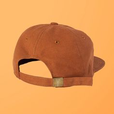 Showcase your love for the desert with our stylish Rust Hat featuring a Joshua Tree Embroidered Patch from Pin Pin Pals! This unstructured 6-panel Field Trip™ hat is crafted from super soft 100% brushed cotton twill fabric, providing a comfortable and relaxed fit. Inspired by vintage workwear hats, it features a timeless design with an adjustable fabric strap and a brass metal clasp, making it ideal for those who wear a 7¼ or smaller hat size. The beautifully embroidered Joshua Tree patch captur Adjustable Cotton Hats For Everyday, Outdoor Cotton Hat With Embroidered Logo, Canvas Snapback Hat With Embroidered Logo, Cotton Snapback Hat, Adjustable Six-panel Brown Baseball Cap, Solid Color Cotton Hats For Streetwear, Brown Adjustable Six-panel Baseball Cap, Adjustable Canvas Snapback Hat With Flat Bill, Cotton Fitted Hat With Flat Bill