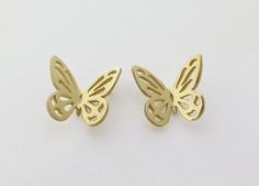 Solid 14k gold butterfly stud earrings.Beautiful and delicate solid gold butterflies, with a lacy pattern cut in their wings.The butterfly is a symbol of transformation, femininity, grace, joy,  and freedom. You can see how the earrings would look on an ear, in the last photo. The earrings in the last photo are made of sterling silver, and you can find them here:https://www.etsy.com/listing/194920687/butterfly-earrings-lacy-butterfly-studs?ref=shop_home_active_11The butterfly measures 1.5 cm/ 0. Elegant Pierced Butterfly Jewelry, 14k Gold Butterfly Earrings With Charm, 14k Gold Butterfly Charm Earrings, 14k Gold Butterfly Earrings With Butterfly Charm, Gold Butterfly Earrings For Formal Occasions, Hypoallergenic Butterfly Yellow Gold Jewelry, Hypoallergenic Butterfly-shaped Yellow Gold Jewelry, Hypoallergenic Yellow Gold Butterfly Jewelry, Luxury Gold Butterfly Earrings