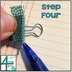 a hand holding a blue pen next to a piece of paper with the word step four written on it