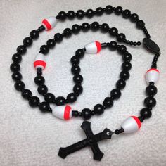 Fishing rosary with no metal parts to rust. Bobbers are Pater Beads. Beads are black wood. Custom order. Black Wooden Beads Rosary Spiritual Style, Black Wooden Beads Rosary, Black Wooden Beads Spiritual Rosary, Black Wood, Wooden Beads, Rosary, Rust, Fishing, Arts And Crafts