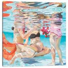 two women in swimsuits are under the water with their backs to each other