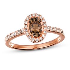 a brown and white diamond engagement ring