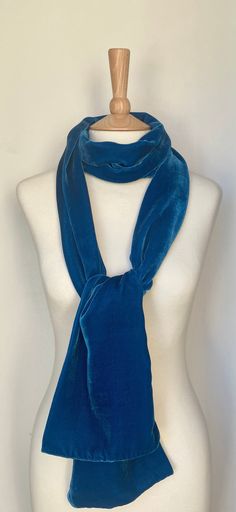 Luxurious and incredibly soft cerulean blue  silk velvet scarf. This scarf is extremely versatile; ideal for wrapping up in the cold weather and offers a touch of glamour to any outfit, whether it be casual or for a special occasion.  This will be perfect as a gift or a treat for yourself.  Composition: 60% Silk and 40%Viscose. Dry Clean Only Elegant Blue Scarf For Winter, Elegant Blue Winter Scarf, Luxury Blue Silk Scarf, Luxury Bohemian Blue Scarves, Luxury Blue Shawl Scarf, Luxury Blue Bohemian Scarf, Luxury Blue Wool Scarf, Blue Silk Scarf, Velvet Scarf