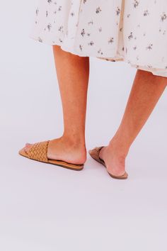 Be a trendsetter in the Lawrence Sandals! These sophisticated shoes come in 2 colors so you can mix and match. Step out in style with the woven upper, squared toe, and comfy padded footbed. Get ready to rock the sandal scene! #summerready Woven upper Man-made material Rubber sole Squared toe Padded footbed Fit is true to size - size up for wider feet Chic Sandals With Woven Sole For Day Out, Open Toe Sandals With Woven Sole For Day Out, Trendy Sandals With Woven Sole For Summer, Trendy Sandals With Woven Sole For Summer Outings, Spring Synthetic Footbed Sandals For Day Out, Synthetic Footbed Sandals For Spring Day Out, Synthetic Footbed Sandals For Day Out, Flat Sandals With Woven Sole For Day Out, Trendy Synthetic Footbed Sandals For Day Out