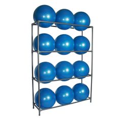 a metal rack holding blue exercise balls on it's sides and two rows of them