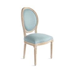 an upholstered chair with a light blue seat