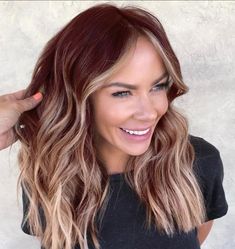 💇‍♀️🌸 Stay ahead of the curve with our guide to the hottest spring hair color trends of 2024! From sun-kissed blondes to vibrant pastels, explore the must-have shades to elevate your look this season. Click to find your perfect spring hair color inspiration! #SpringHairColor #HairTrends2024 #HairInspiration Hair Color Ideas For Burgundy, Red Blonde Color Melt, Red Brown Balayage With Money Piece, Reddish Brown Hair With Blonde Money Piece, Trendy Auburn Hair, Red Brown With Blonde Balayage, Red Brown With Blonde Money Piece, Auburn Hair Color With Blonde Balayage, Red Blond And Brown Hair