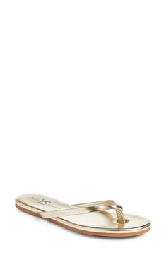 Finish your look with the breezy style of this minimalist flip-flop. Synthetic upper, lining and sole Imported Elegant Slip-on Flip Flops For Spring, Chic Flip Flops With Cushioned Footbed And Toe Post, Chic Toe Post Flip Flops With Cushioned Footbed, Spring Toe Post Flip Flops With Textured Footbed, Gold Slip-on Flip Flops For Spring, Gold Cushioned Flip Flops For Spring, Spring Flip Flops With Removable Insole And Toe Post, Spring Cushioned Flip Flops With Single Toe Strap, Breezy Style