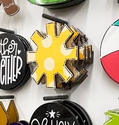 several different types of magnets on a wall with the words hello summer written on them