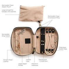 an open suitcase with jewelry inside and labeled parts labelled in the description below to describe what it is