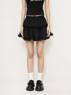 Exude confidence with every step in this moody Layered Ruffle Mini Skirt with Lace Trim, where edgy meets delicacy in perfect harmony. Crafted from soft, breathable cotton, this skirt is as comfortable as it is stylish. The intricate lace trim and cascading ruffled layers generate a uniquely textured silhouette that's both flirty and sophisticated. Its high-waisted design ensures a flattering fit, while the A-line cut offers ease of movement, making it an ideal choice for those spontaneous outin Skirt With Lace Trim, Ballet Style, Flared Mini Skirt, Skirt With Lace, Ruffle Mini Skirt, Outer Jacket, Ballet Fashion, Style Skirt, One Piece Dress