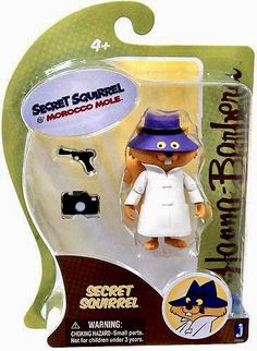 an action figure in a package for the animated movie secret squirrel and moscoo man