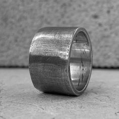 "At the moment we have difficulties with the payment system and we only accept payment through PAYPAL. When placing an order, select PAYPAL as a payment method. Otherwise, we will have to cancel your order. Thank you for understanding! ... The Stripe ring Width: 14 mm Thickness: 2 mm Processing Type: Volcanic oxidation+Polishing Description: Extra-wide band ring with light matte texture.For connoisseurs of minimalism. Stylish ring but not flashy. The perfect addition to your look. We can engrave Rustic Silver Untreated Rings, Rustic Untreated Silver Ring, Acid Rain, Texture Metal, Wide Ring, Matte Texture, Ring Mens, Stylish Rings, Wide Rings