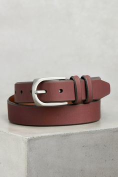 Smooth water buffalo leather with lining and double keeper, beveled tip, matte silver-tone buckle. Modern Bridle Leather Belt For Business, Modern Leather Belt Buckles, Modern Leather Belt Buckles For Office, Casual Leather Belt Buckles For Workwear, Sleek Leather Belts For Office, Sleek Leather Office Belt, Sleek Leather Belt Buckles For Workwear, Brown Leather Belt Buckles For Office, Modern Brown Belts For Office Wear