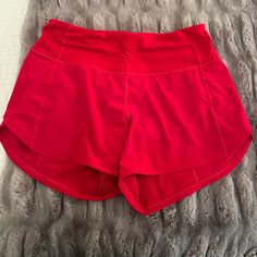 New Without Tags: Size 4: Red Lululemon Shorts Red Activewear With Built-in Shorts, Red Athleisure Activewear With Built-in Shorts, Red Yoga Activewear Shorts, Red Gym Bottoms With Built-in Shorts, Red Stretch Running Shorts, Red Activewear For Sports In Short Length, Red Short Length Activewear For Sports, Red Moisture-wicking Shorts For Running, Red Go-dry Athletic Shorts For Gym