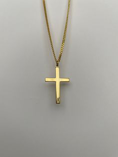 Classic Cross Pendant Necklace As Gift, Yellow Gold Cross Necklace As A Gift, Classic Gold Cross Necklace, Yellow Gold Cross Necklace Gift, Yellow Gold Cross Necklace Pendant As Gift, Gold Cross Necklace For Gift, Gold Cross Necklace With Polished Finish, Gold Hallmarked Cross Necklace As A Gift, Spiritual Gold Cross Necklace