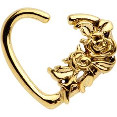 a gold rose shaped nose ring on a white background