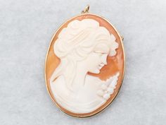 Gorgeous yellow gold and an oval cut cameo make for a splendiferous symbol of style and class! Whether you wear it as a brooch or a pendant, your outfit will look a million bucks! This pendant does not come with the chain shown. Please feel free to contact us, we will help you find the perfect chain for your style and budget! Metal: 14K Yellow Gold Gem: Cameo Gem Measurements: 27.9 x 34.8 mm, Oval Measurements: 28 x 41 mm, with bail SKU #: A35980 Each piece has been identified and graded by a Gr Cameo Jewelry, Cameo Brooch, Cameo Pendant, Gold Gift, New Hampshire, Hampshire, Oval Cut, Massachusetts, Etsy Accessories