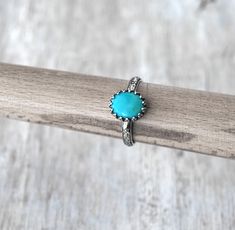 American Turquoise in Sterling Silver - Handcrafted Artisan Silver Ring ● 10x8 mm American Turquoise (stabilized) ● 3 mm Sterling Silver band Please allow 3-4 business days for your ring to be made to order in your size. Gift box available. Ring Sizer: If you do not know your RING SIZE, you can purchase a ring sizer from my shop here: http://www.etsy.com/listing/127527482/ring-sizer Other Rings: http://www.etsy.com/shop/PrairieCoastArt?section_id=13276453 SHOP HOME: http://www.etsy.com/shop/Prai Sterling Silver Opal Ring, Silver Turquoise Ring, October Birthstone Rings, Silver Opal Ring, Sterling Silver Rings Turquoise, Turquoise Ring Silver, American Turquoise, Shine Bright Like A Diamond, Ring Sizer