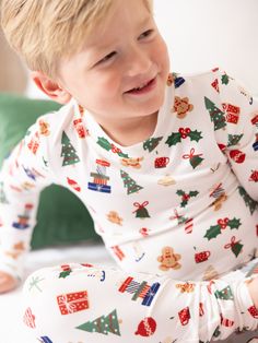 Celebrate the magic of the holiday season with our Family Pajamas. Perfect for creating sweet, lasting memories with your family, these matching pajamas bring a sense of togetherness and festive cheer. Made from our signature ButterSoft fabric, you'll stay cozy and comfortable, whether you're decorating the tree, baking cookies, or enjoying a holiday movie night together. Sizing Model is wearing YS. YS = 6/7 | Chest 22.75", Waist 20.75", Hips 22", Inseam 28" YM = 8 | Chest 24.5", Waist 22.5", Hi Playful Long Sleeve Christmas Sleepwear, Family Matching White Christmas Sleepwear, White Family Matching Christmas Sleepwear, Playful Christmas Sleepwear, White Christmas Sleepwear Sets, White Family Matching Sets For Holidays, Playful Long Sleeve Sleepwear For Holidays, White Christmas Pajama Party Sleepwear, White Christmas Sleepwear For Pajama Party