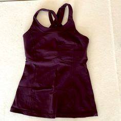 Lululemon Dark Purple Workout Shirt W/Shelf Bra. Never Worn. Measurements Laying Flat: ~15in Armpit To Hem ~13in Across Chest Purple Sportswear Top For Workout, Purple Moisture-wicking Training Tops, Purple Go-dry Athleisure Top, Purple Fitted Athleisure Tank Top, Purple Gym Tops With Built-in Bra, Fitted Purple Athleisure Tank Top, Fitted Purple Tank Top For Athleisure, Purple Moisture-wicking Tops For Yoga, Purple Moisture-wicking Yoga Tops