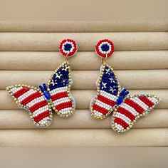 These Statement Making And Beautifully Detailed American Flag Butterfly Earrings Are Perfect For Any Patriotic Festivities All Year Long And Will Get Lots Of Attention And Compliments! Main Material: Glass Beads Earring Needle Material: Healing And High Vibrational Copper Brand New. Never Worn Incredibly Lightweight For Their Size As The Felt Backing Is Sturdy But Light. Approximate Dimensions: L - 2.95in // W - 2.17 See More Than One Item In My Closet That You Love? Bundle 2 Or More Items To Receive A Special Discount Offer And Save On One Shipping Charge! Patriotic Blue Beaded Earrings As Gift, Patriotic Beaded Earrings, Beaded Earrings For 4th Of July Gift, Blue Patriotic Beaded Earrings As Gift, Patriotic Blue Beaded Earrings, Flag Beads, Loom Jewelry, Seed Bead Patterns, Butterfly Earrings